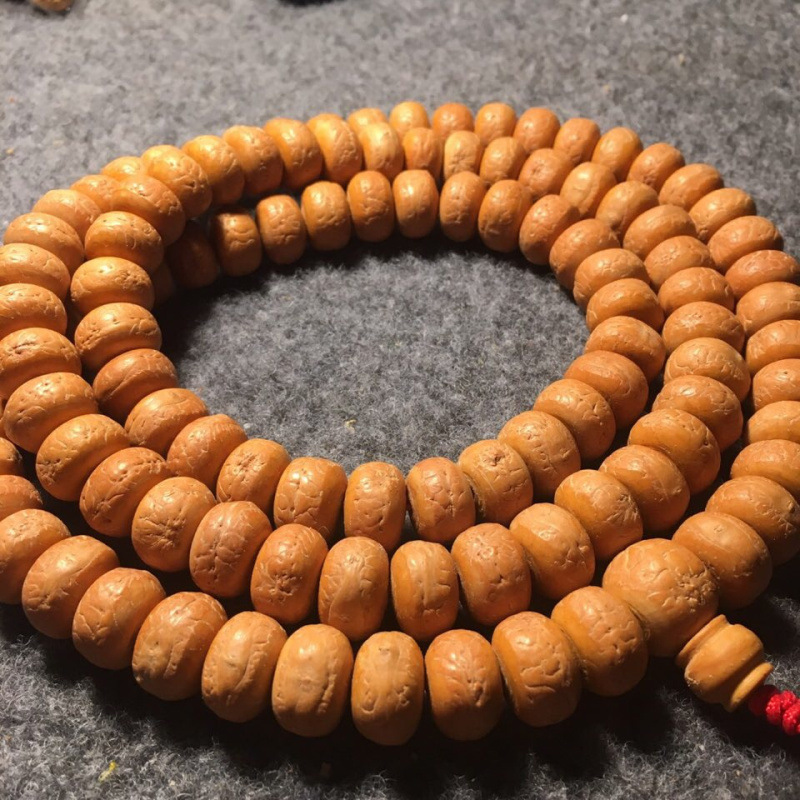 藏式凤眼原籽姜黄皮黄皮手持念珠