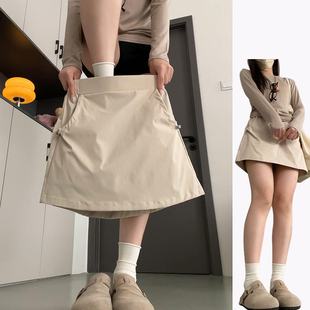 卡其色韩系时尚半身短裙女夏季2025新款蚂蚁腰A字带打底工装裙裤