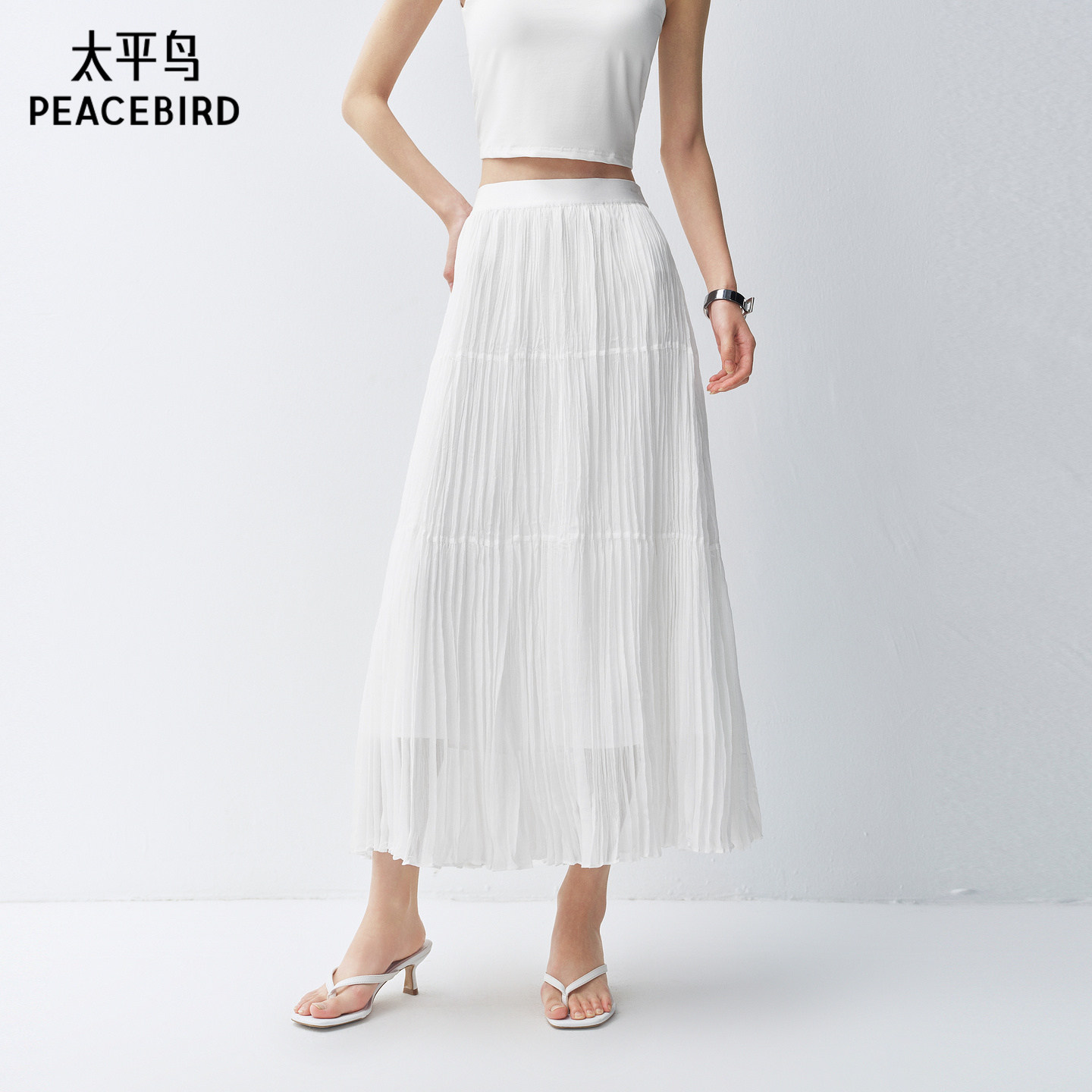 太平鸟百褶迷笛裙女白色半身蛋糕伞裙出游长款波嬉风2026春夏新款