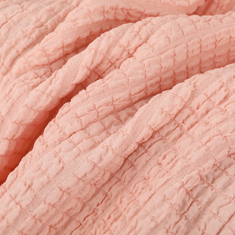 320g头饰提花泡泡格面料高弹力凹凸大花型布料女装童装涤纶面料