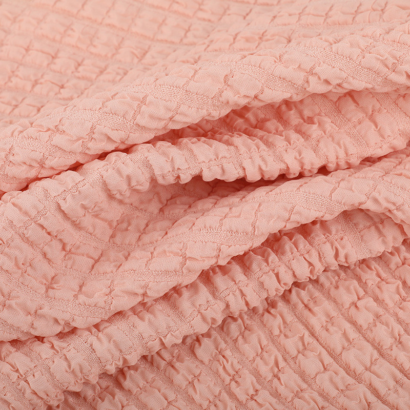 320g涤纶提花面料格面料高弹力凹凸大花型布料女装童装头饰泡泡