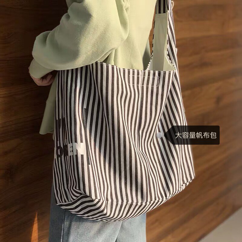 原宿單肩斜挎包女百搭大容量日系條紋帆布袋學生寬肩帶書包2021在類目 箱包皮具/熱銷女包/男包, 女士包袋中 - 來自Buy2taobao.com提供專業的淘寶代購服務