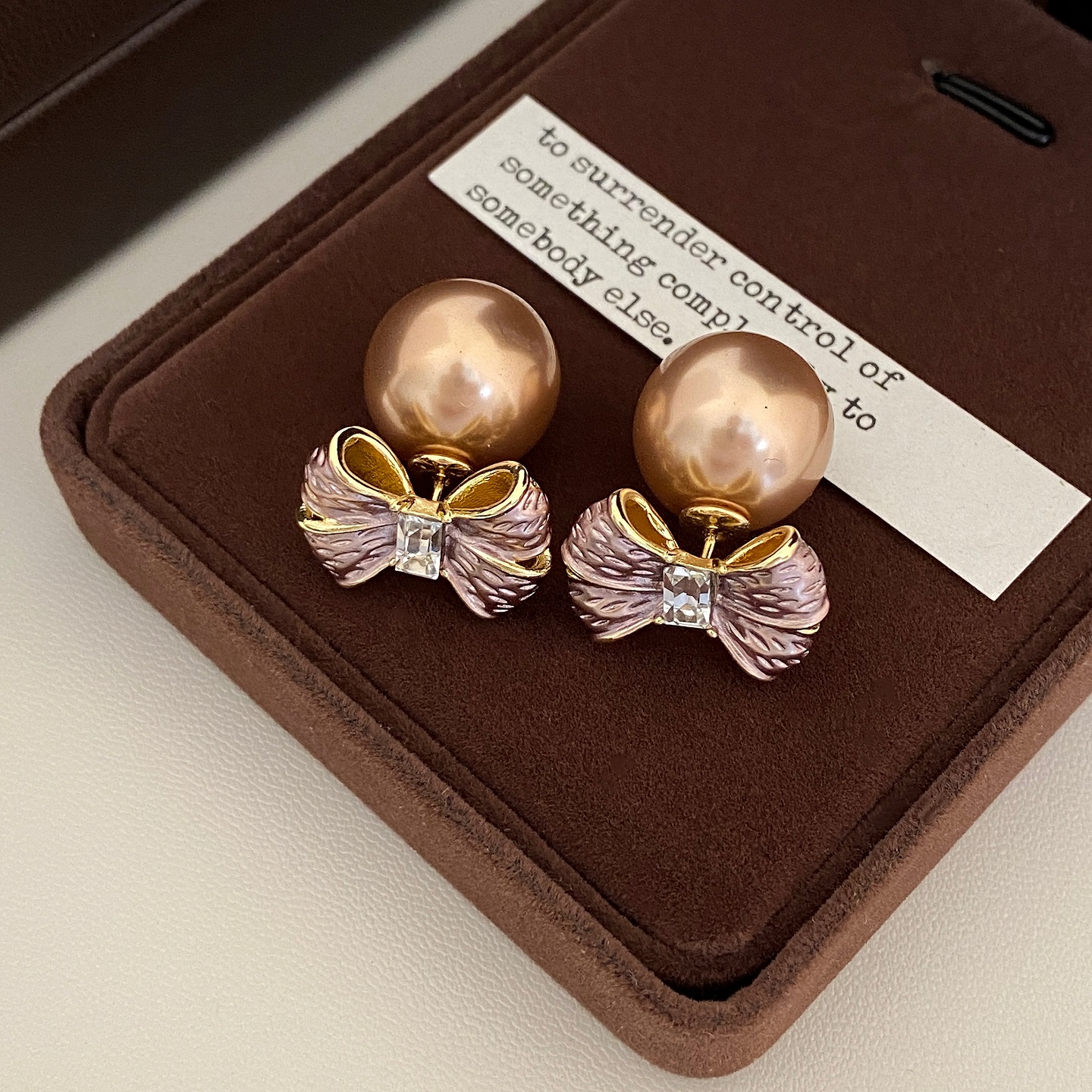 一款两戴蝴蝶结珍珠耳钉小众气质高级感冷淡风耳环女小巧简约百搭