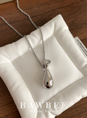 秋冬中古重工搭配夸张叠戴酒壶