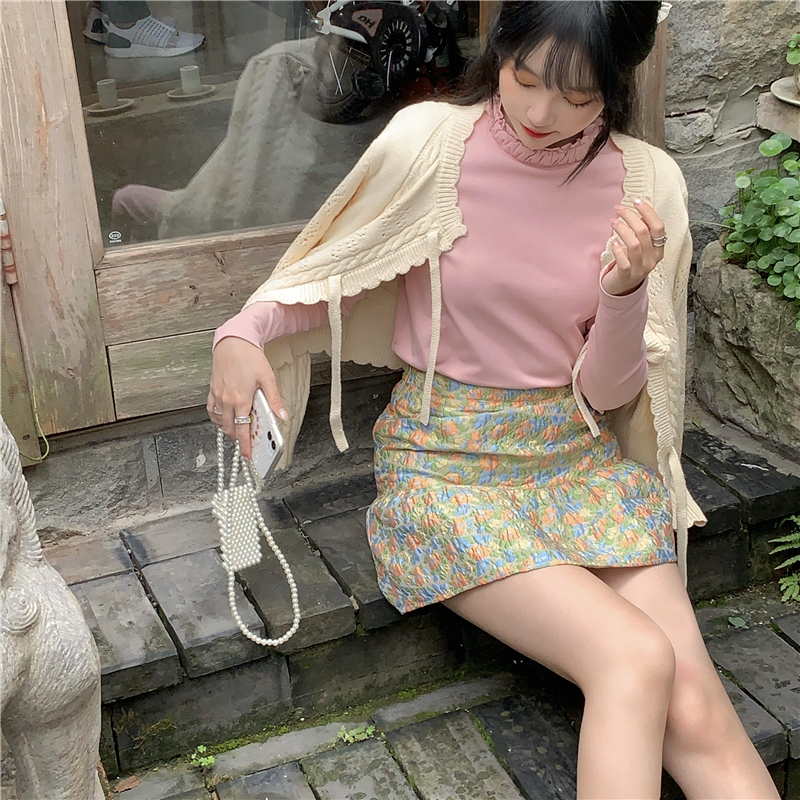 Real shot real price hollow out knitted cardigan bow coat + half high collar bottoming shirt + small flower high waist skirt