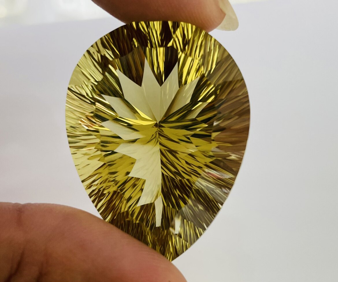 天然大颗粒原石柠檬晶黄水晶千禧切割91.6CT全净体水滴裸石戒面