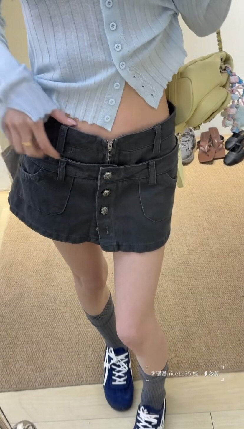 辣妹设计感工装牛仔短裙女2026春夏新款高腰排扣防走光包臀半身裙