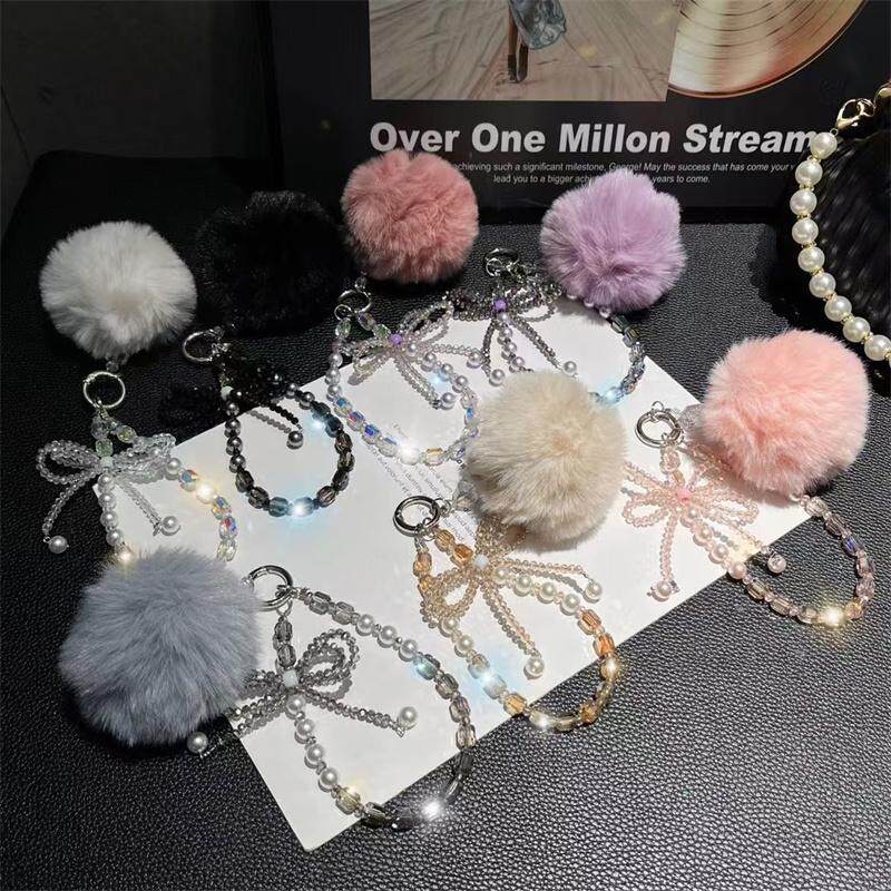 高颜值水晶蝴蝶结毛球珠手机挂链ins腕带包包挂饰结实防掉装饰品