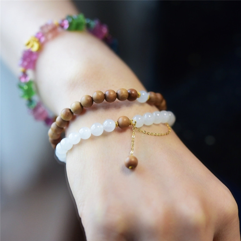 一斤钻戒一级白玉圆珠18K金镶嵌老山檀珠点缀天然和田白玉手链