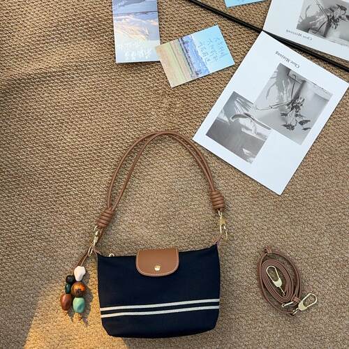 TANGFEEL牛仔新款小众设计单肩斜挎通勤百搭女款高级感饺子包洋气