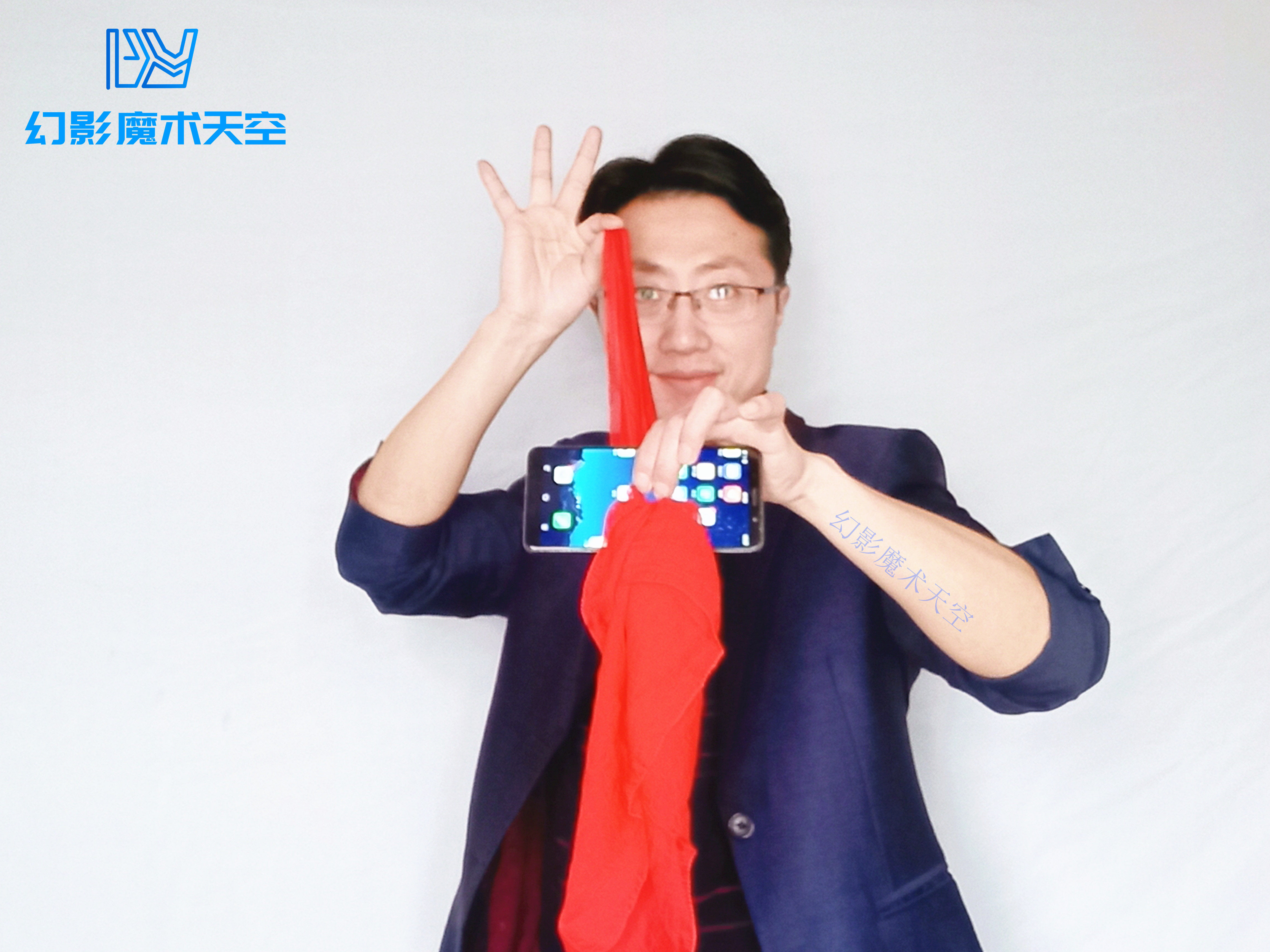 丝巾穿越手机魔术道具