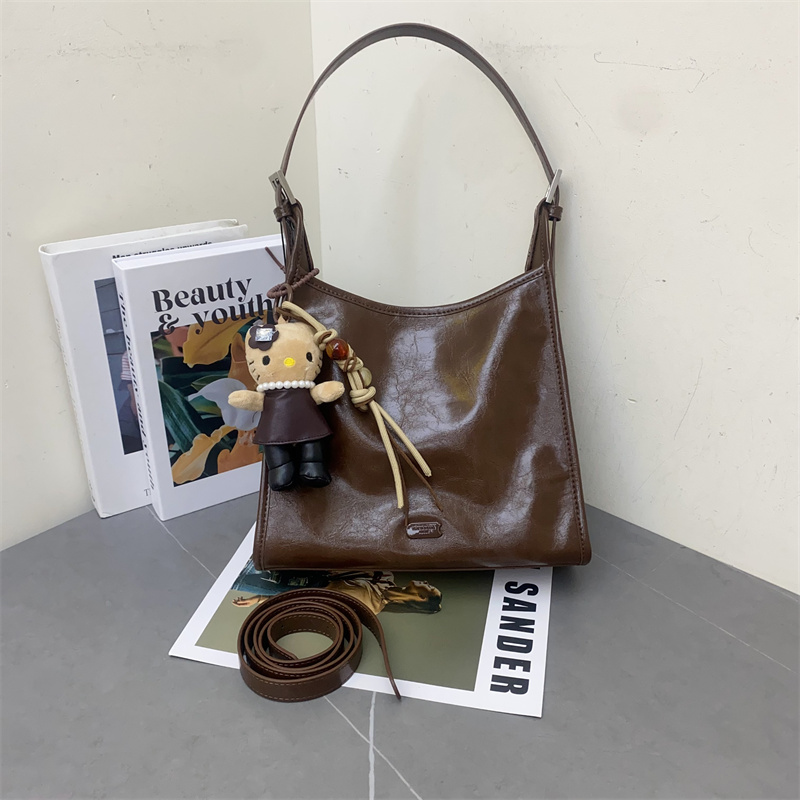 油蜡皮水桶包通勤大容量单肩斜跨