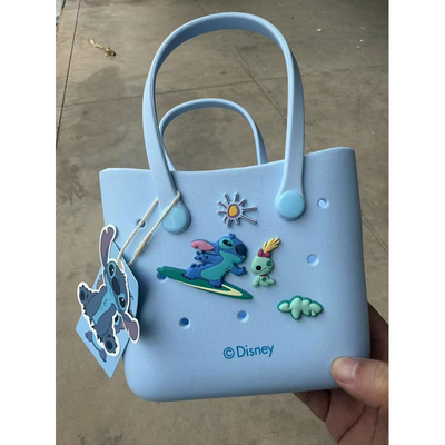 名创优品miniso洞洞包手提包