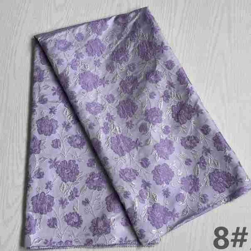 新款时尚大提花色织高精密织金立体服装面料工厂