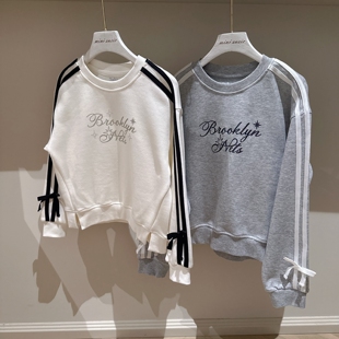 120-150韩系女童两色烫钻印花字母蝴蝶结袖子卫衣