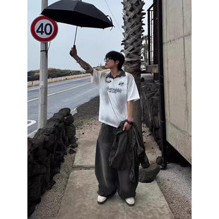 韩国东大门代购高街潮流时尚做旧弧形拼接收脚弯刀牛仔裤男女款