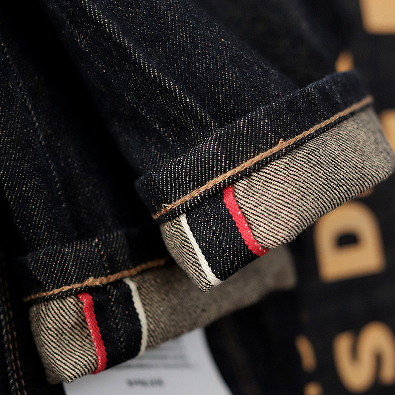 红白赤耳丹宁水洗脱桨牛仔裤