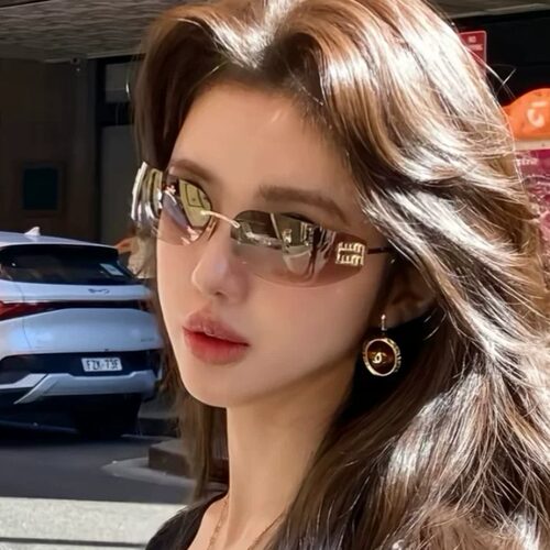 2026新款无框茶色曲面屏墨镜高级感太阳镜街拍防紫外线女韩版古早