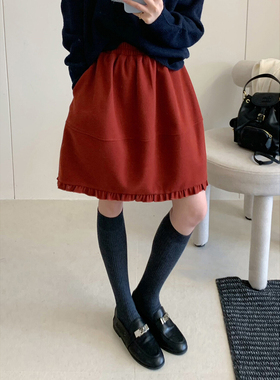 2025冬季百搭气质A字中款韩系复古木耳边红色花苞毛呢半身裙女