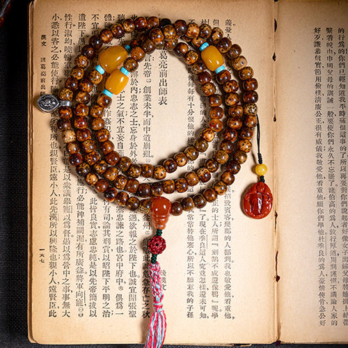 星月菩提子手串陈籽流苏蜜蜡配饰