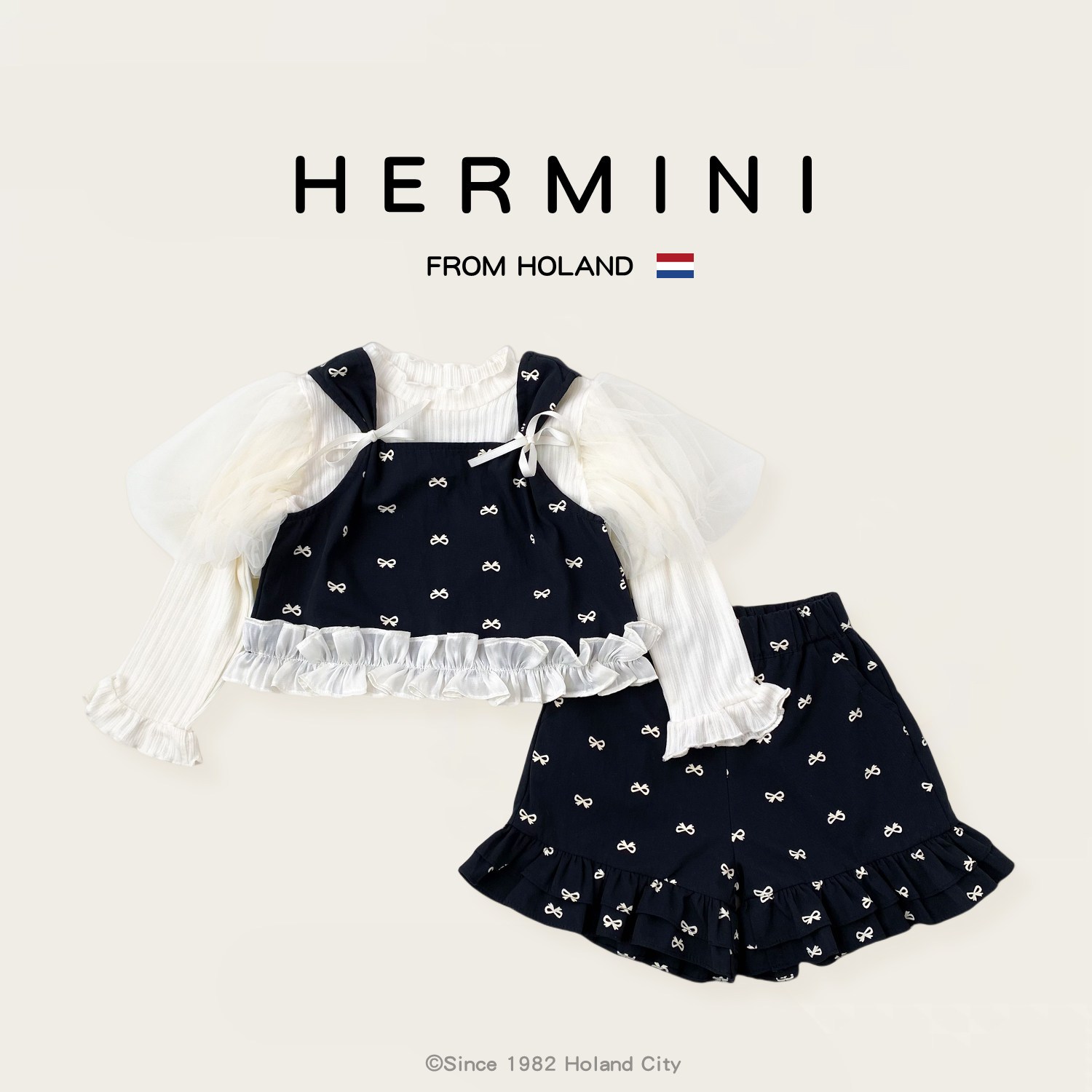 荷兰HERMINI春季新款女童洋气蝴蝶结背心短裤泡泡袖打底衫三件套