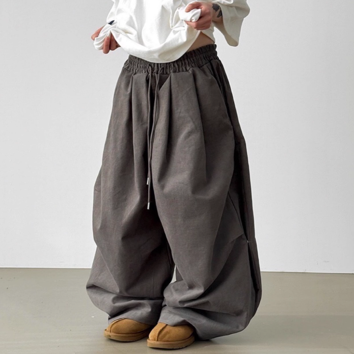 韩国代购设计师宽松捏褶系扣长裤