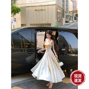 Sun雅乔 夏秋少女感收腰绑带吊带连衣裙缎面蝴蝶长裙 气泡香槟