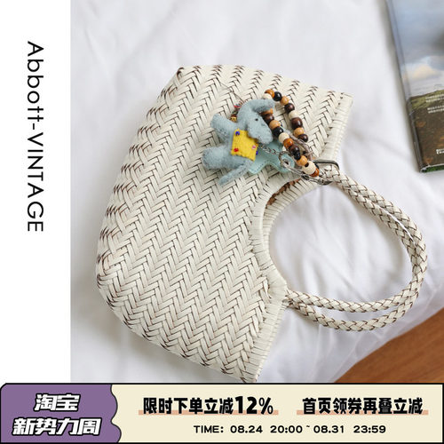 牛皮编织手提斜挎度假包菜篮包