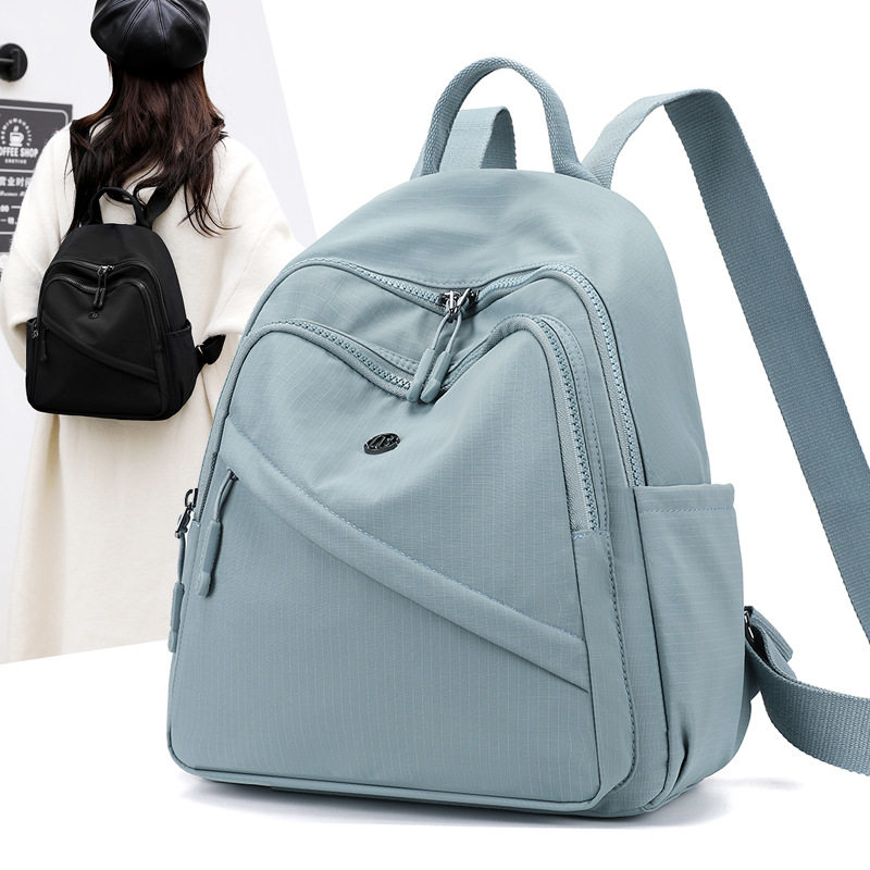 驰豹新款双肩包大容量双拉链时尚休闲背包百搭纯色女士背包旅游包