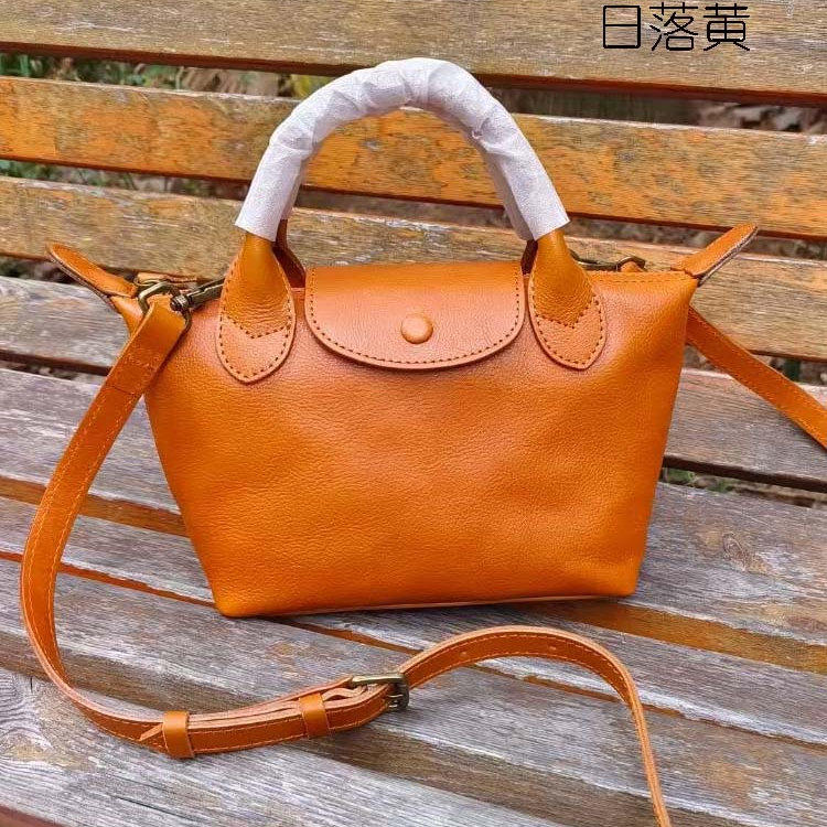 原创真皮女包波士顿枕头包手提包2025新款简约大容量龙骧包斜挎包