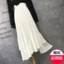 Váy dài mùa hè nữ không đều xếp li xếp li váy khí chất màu đen con lắc lớn dài trắng kỳ nghỉ váy mỏng - Váy chân váy chữ a dáng dài