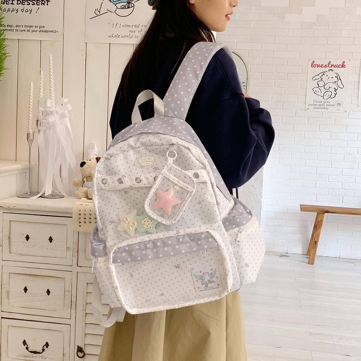 可爱少女波点高颜值书包女初高中学生大容量小清新双肩包