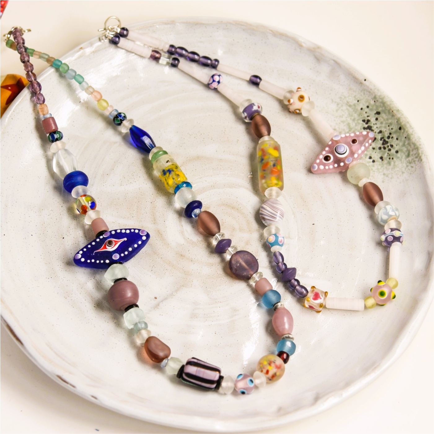 风鸣两岸叶，月照一孤舟。原创彩色琉璃紫色系项链女款2024新款