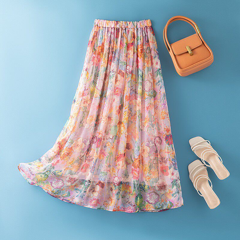 杭真丝半身裙女2025春夏新款橡筋高腰飘逸海边度假桑蚕丝印花中长