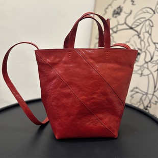 植鞣牛皮简约通勤水桶包头层牛皮小众质感手提包轻奢高级感斜挎包