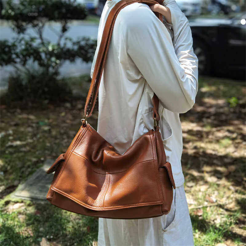 牛皮大容量休闲托特包2024新款真皮翻盖包单肩斜挎包百搭通勤女包,箱包皮具/热销女包/男包,托特包,淘宝优惠券,粉丝福利购,淘宝优惠卷