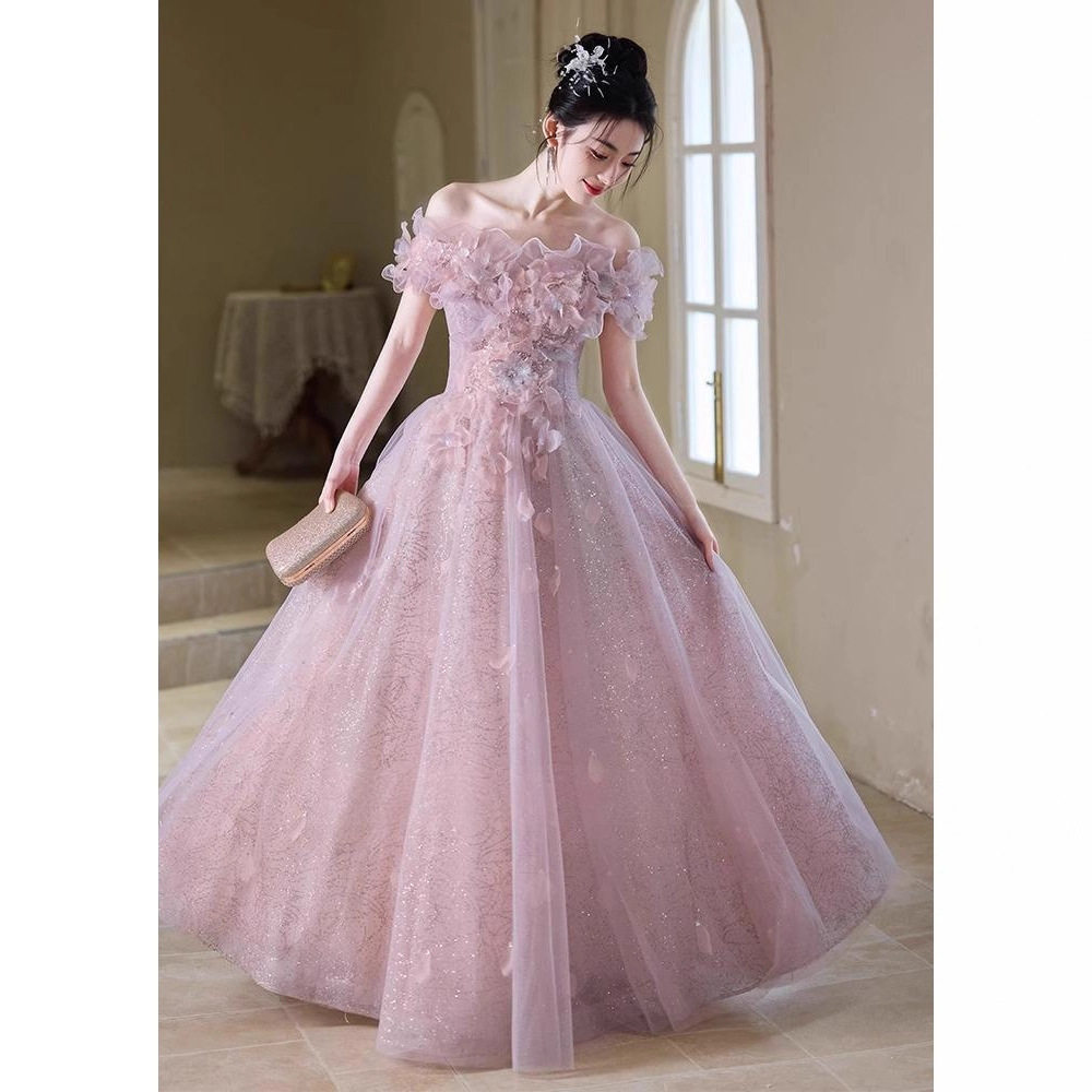 粉色晚礼服森系一字肩轻奢2026新款毕业主持人长裙艺考成人礼礼服