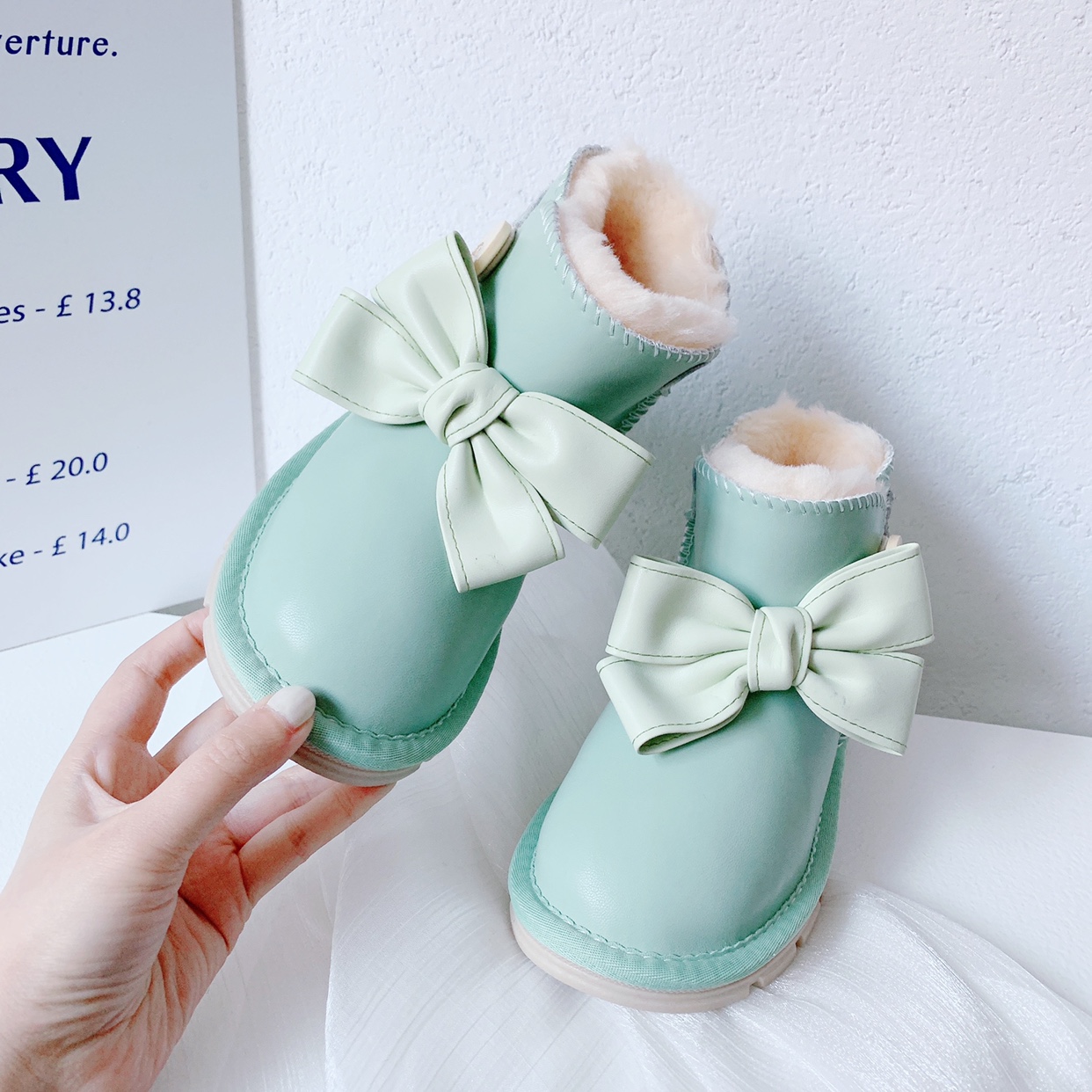 儿童糖果色雪地靴2024年冬季新韩版公主真皮绿色保暖靴蝴蝶结靴子