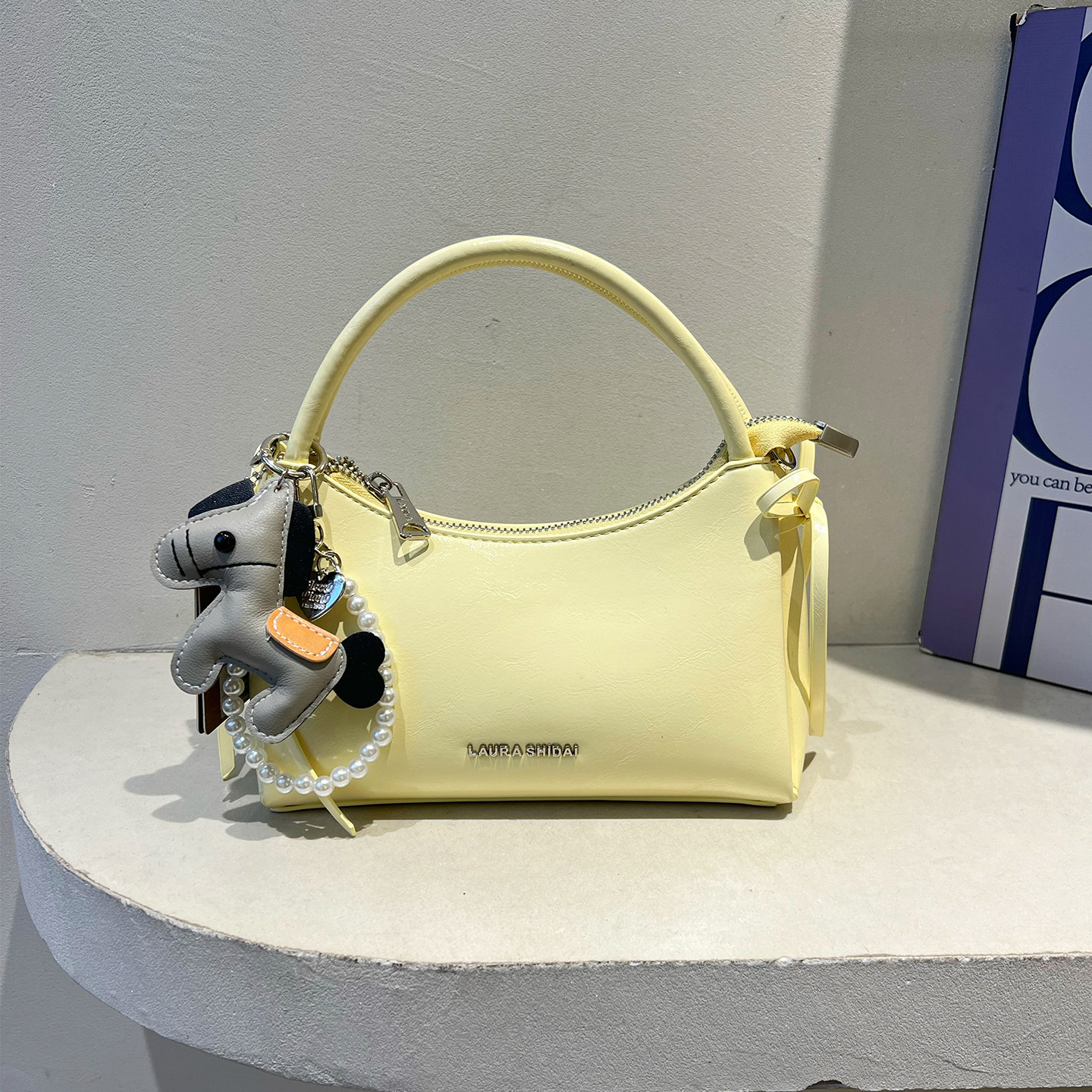 劳拉时黛时尚蝴蝶结手提小方包糖果色单肩包女2026春夏新款斜挎包