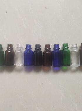 分装瓶空瓶厂价直销平肩矮胖透明茶色绿色兰色黑色玻璃精油瓶15ml