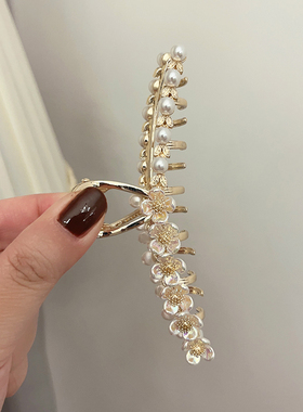 超仙高级感珍珠贝壳花抓夹