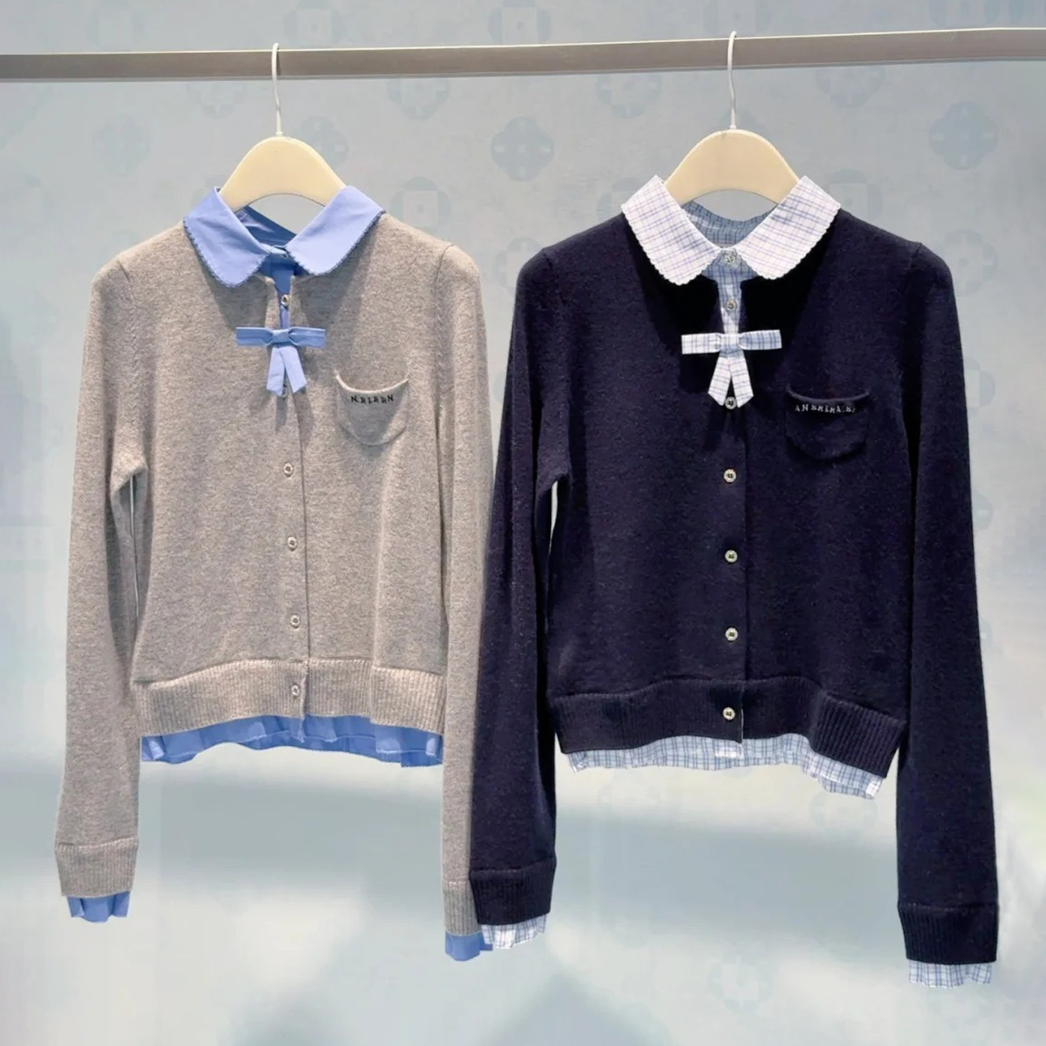 深圳南油高端女装2026春季新款学院风假两件蝴蝶结软糯毛针织衫女