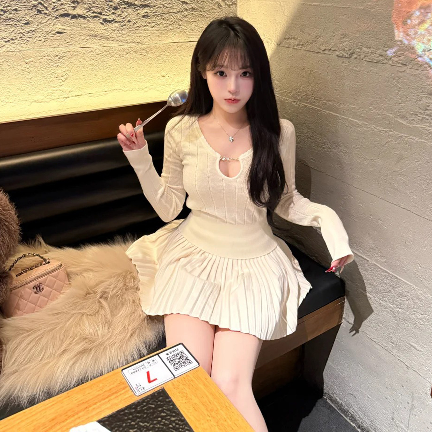 2026春季新款辣妹纯欲心机镂空设计感收腰显瘦性感长袖毛针织衫女