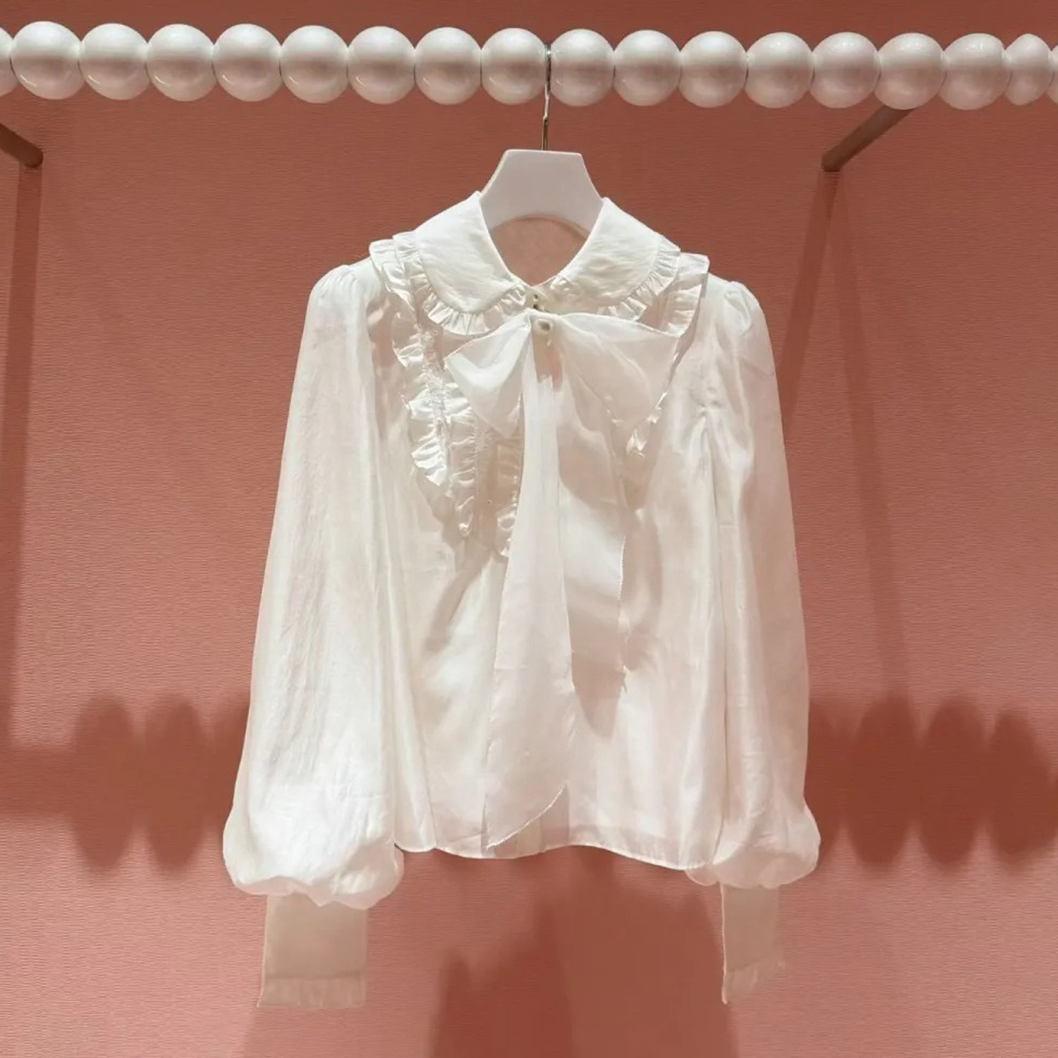 深圳南油高端女装2026春季新款淑女风白色蝴蝶结飘带高级感衬衫女