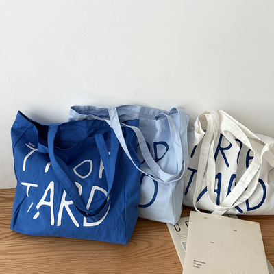 胖老与瘦竹2025新款纯棉法式慵懒风克莱因蓝帆布包简约托特包书包