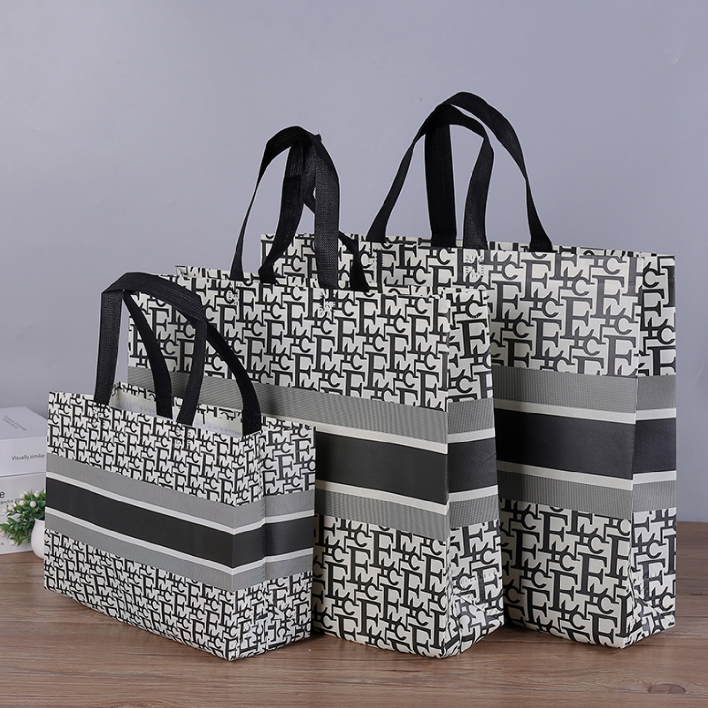 厂家直销无纺布服装手提袋覆膜男女衣服鞋购物环保礼品袋定制logo