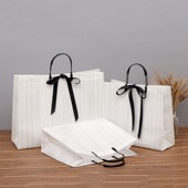 素色无纺布礼品袋叉耳丝带手提袋覆膜服装 袋化妆品加厚购物袋定制