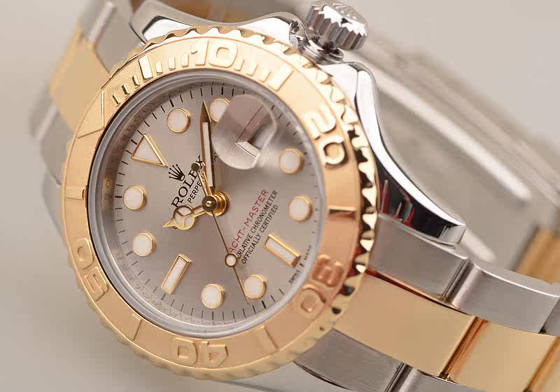 已售出【97新】劳力士游艇名仕型间金灰盘大三针日历自动机械女表169623