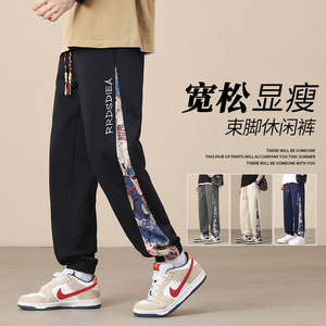 K7930P32卡通拼接裤子宽松束脚时尚休闲裤男潮牌青少年运动长裤图片