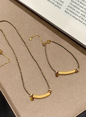 法式轻奢拉丝微笑虎眼石项链简约高级感精致百搭复古编织锁骨链女